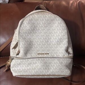 Michael Kors Cream Monogram Backpack with Gold Accents